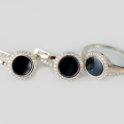 Срібний набір з золотими пластинами