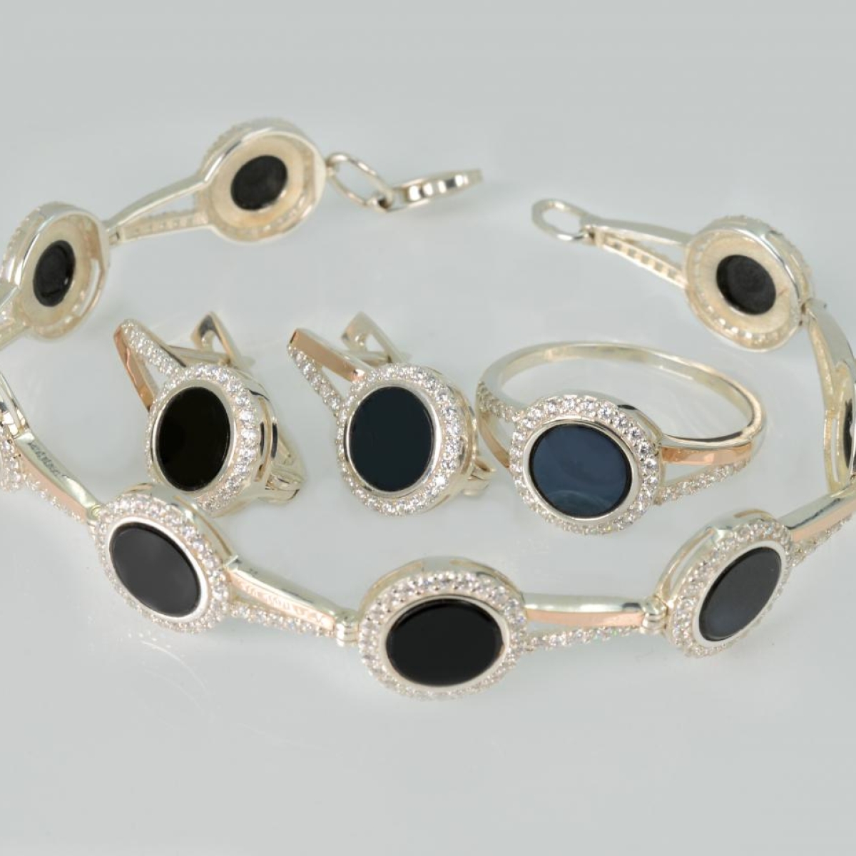 Срібний набір(браслет, сережки,каблучка) з оніксом