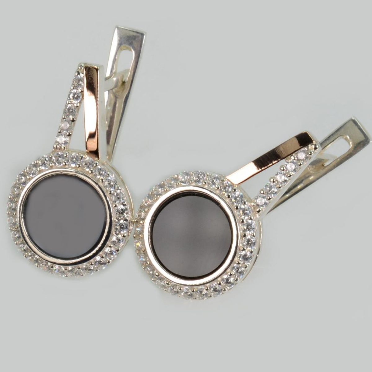 Срібні сережки з золотими пластинами