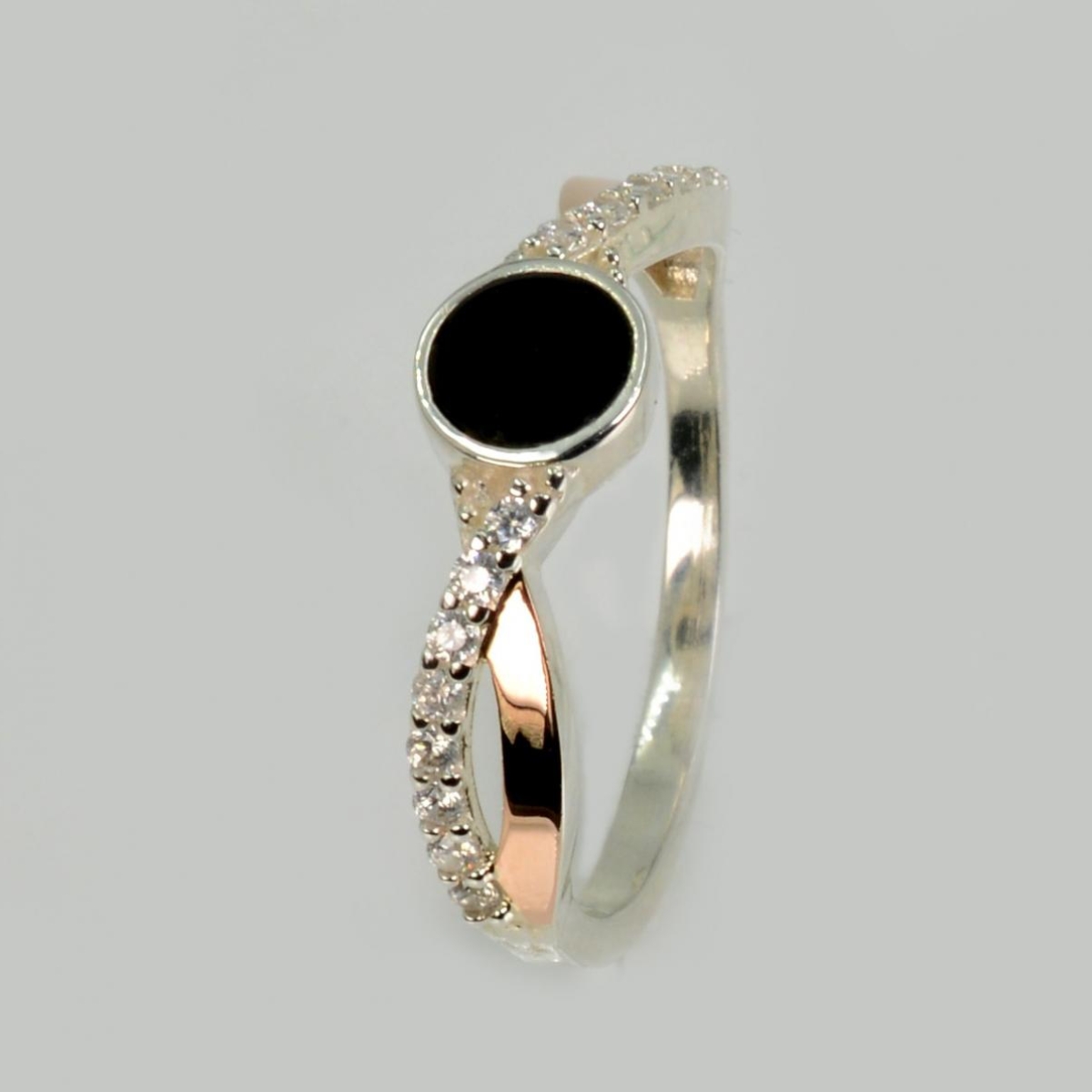 Серебряное кольцо с золотыми вставками