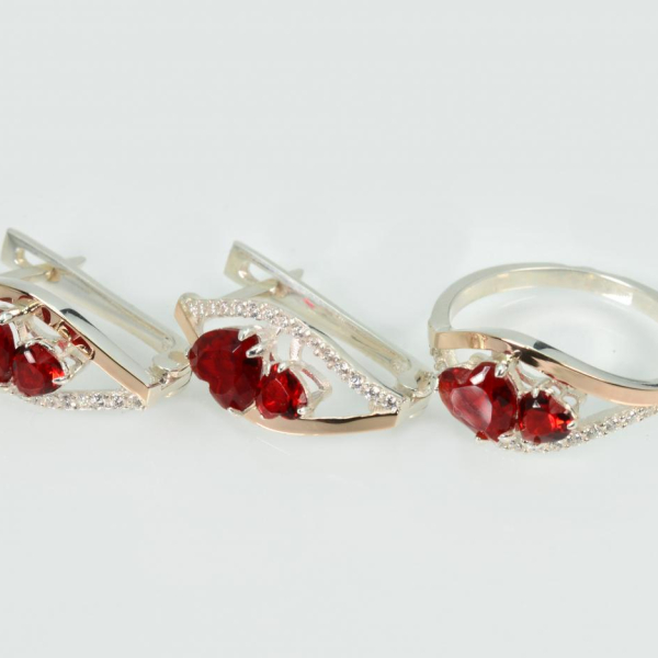 Срібний набір з золотими пластинами