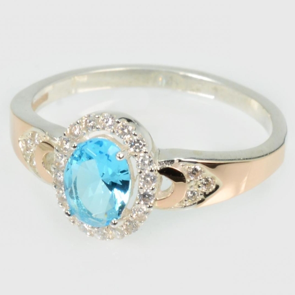 Серебряное кольцо с золотыми вставками