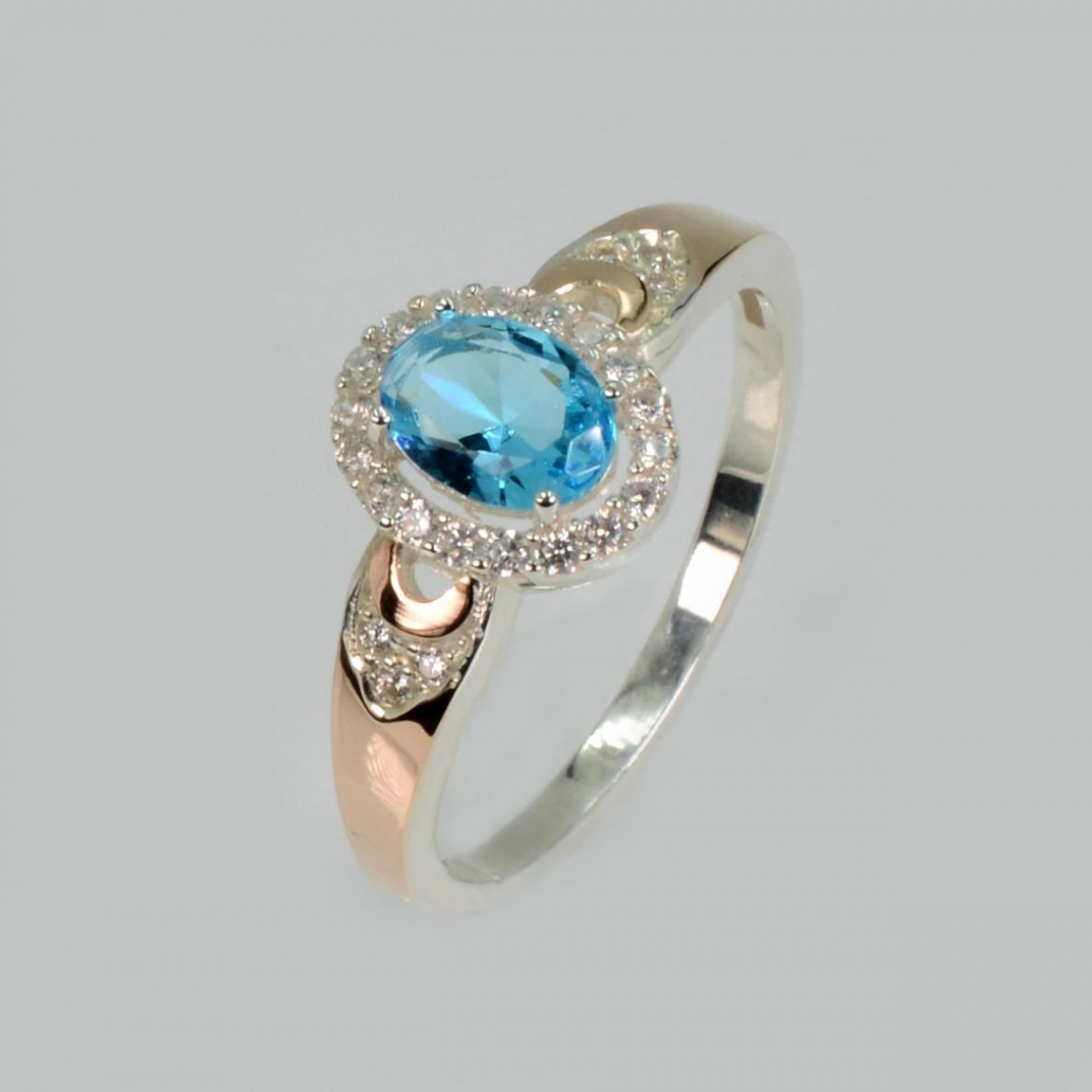 Серебряное кольцо с золотыми вставками