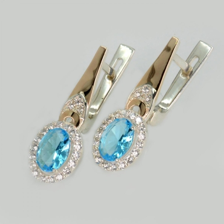 Срібні сережки з золотими пластинами