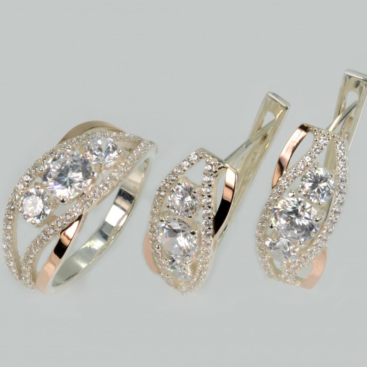 Срібний набір з золотими пластинами