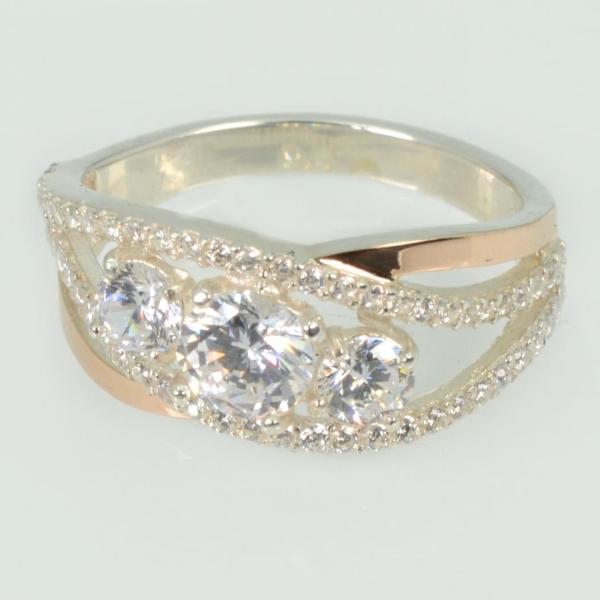 Срібна каблучка з золотими вставками