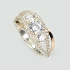 Срібна каблучка з золотими вставками