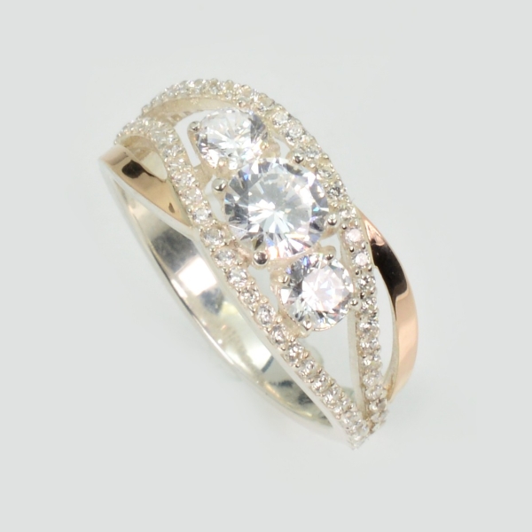 Срібна каблучка з золотими вставками