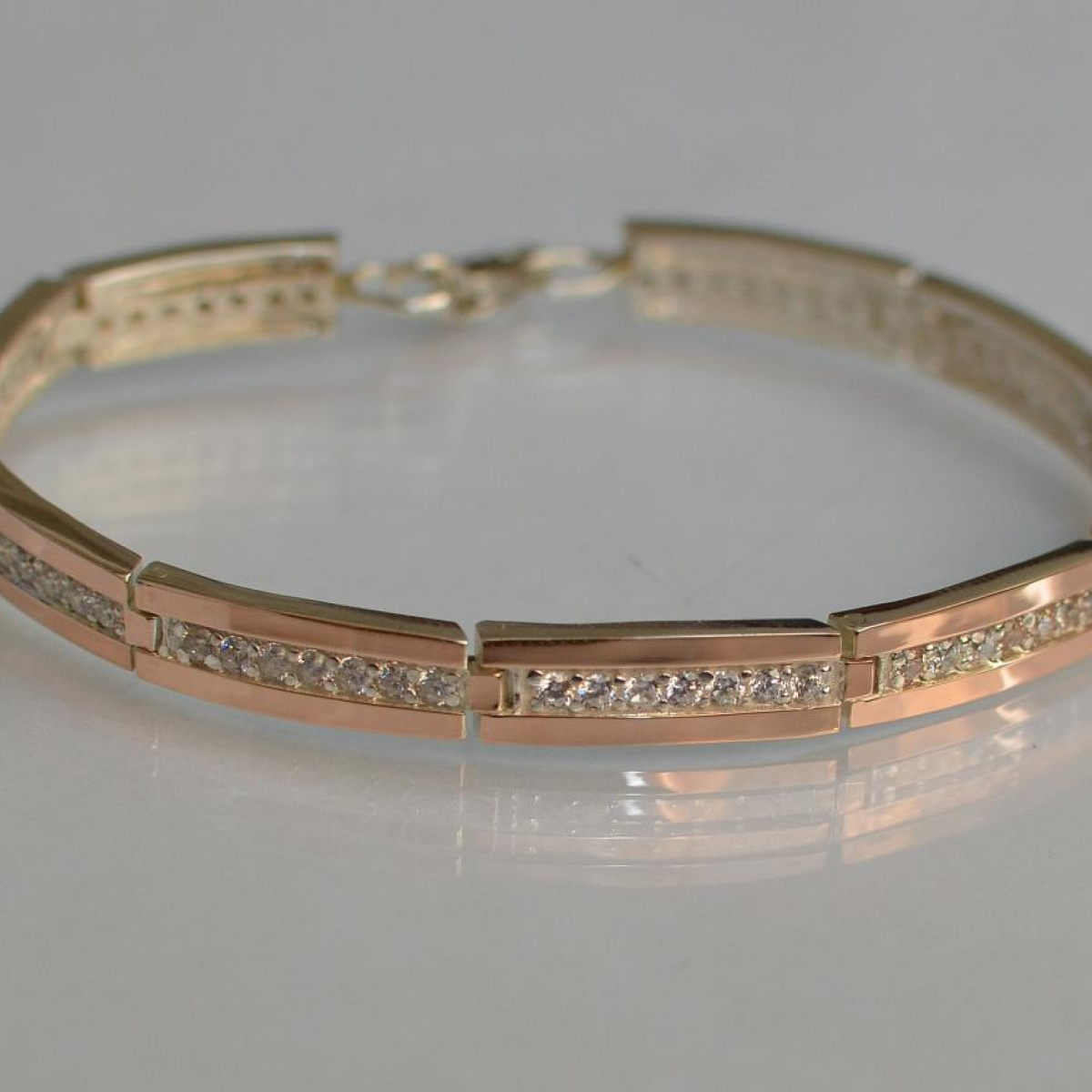 Срібний браслет з золотими напайками