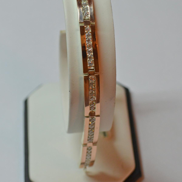 Срібний браслет з золотими напайками