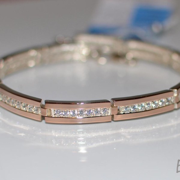 Срібний браслет з золотими напайками