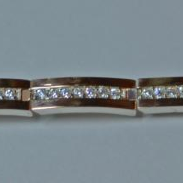 Срібний браслет з золотими напайками