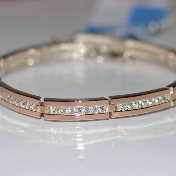 Срібний браслет з золотими напайками