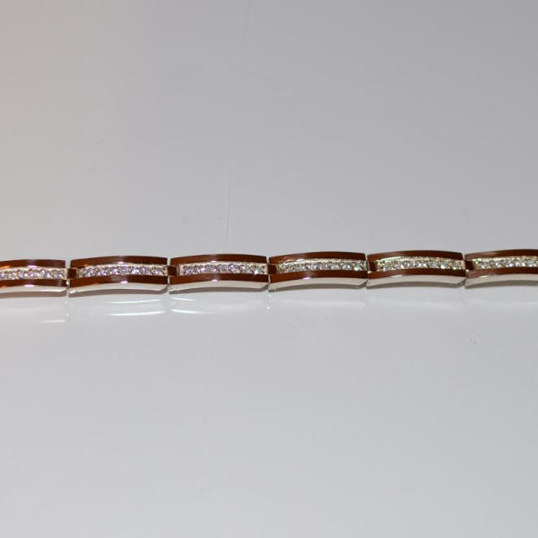 Срібний браслет з золотими напайками