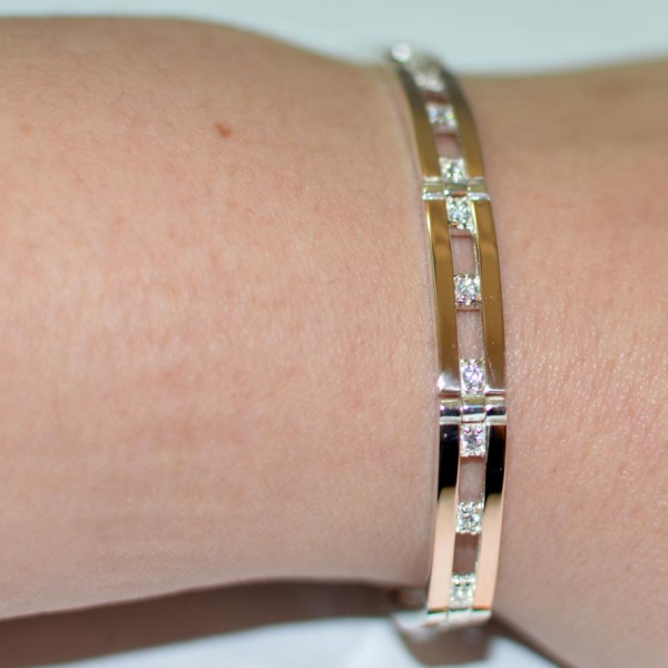 Серебряный браслет с золотыми вставками