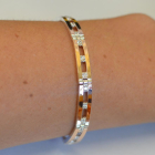 Серебряный браслет с золотыми вставками