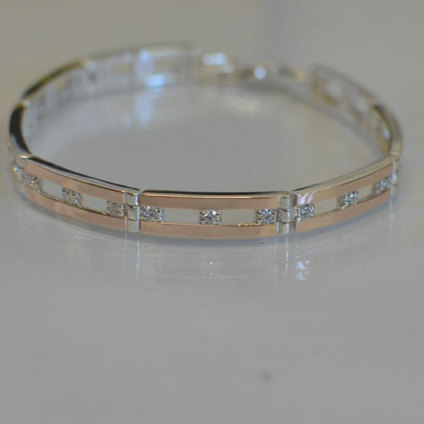 Серебряный браслет с золотыми вставками