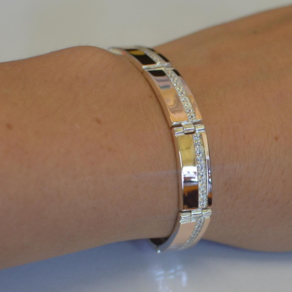 Срібний браслет з золотими вставками