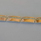 Срібний браслет з золотими вставками