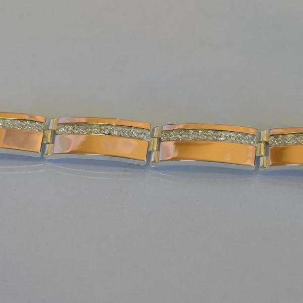 Срібний браслет з золотими вставками