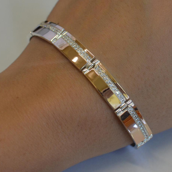 Срібний браслет з золотими вставками