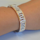 Срібний браслет з золотими пластинами