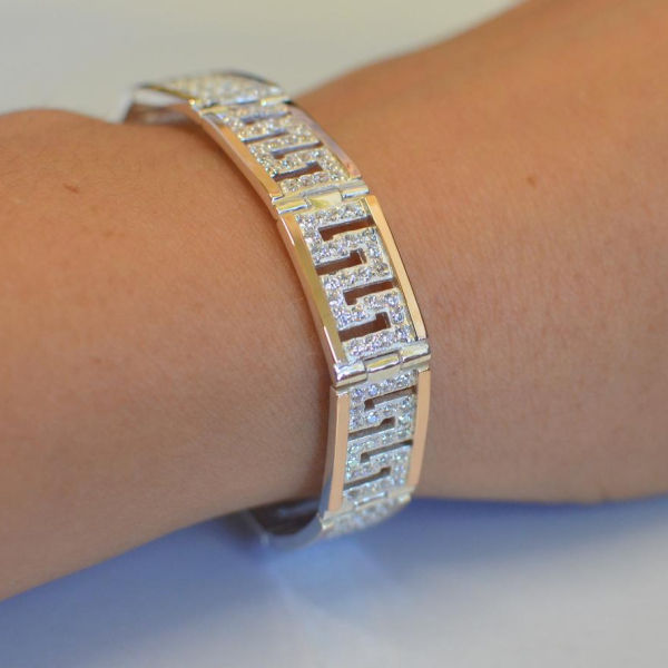 Срібний браслет з золотими пластинами