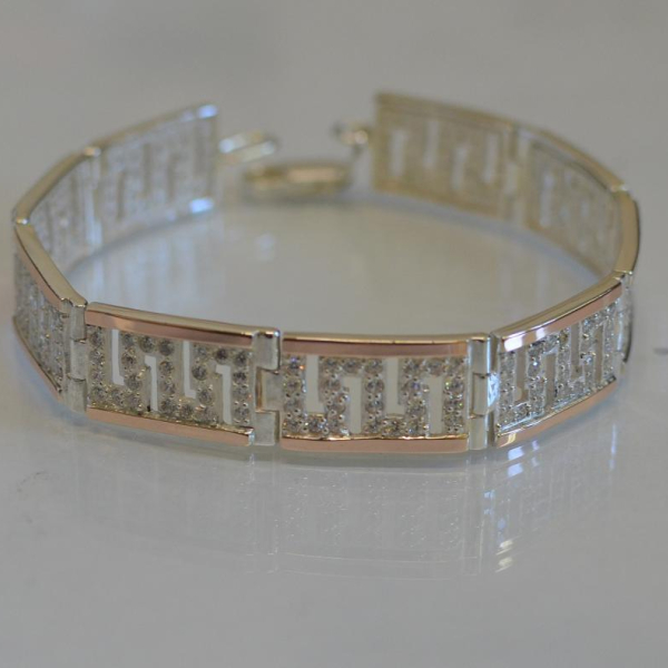 Срібний браслет з золотими пластинами