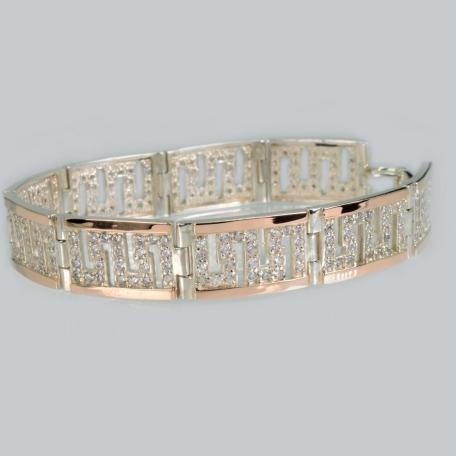 Срібний браслет з золотими пластинами