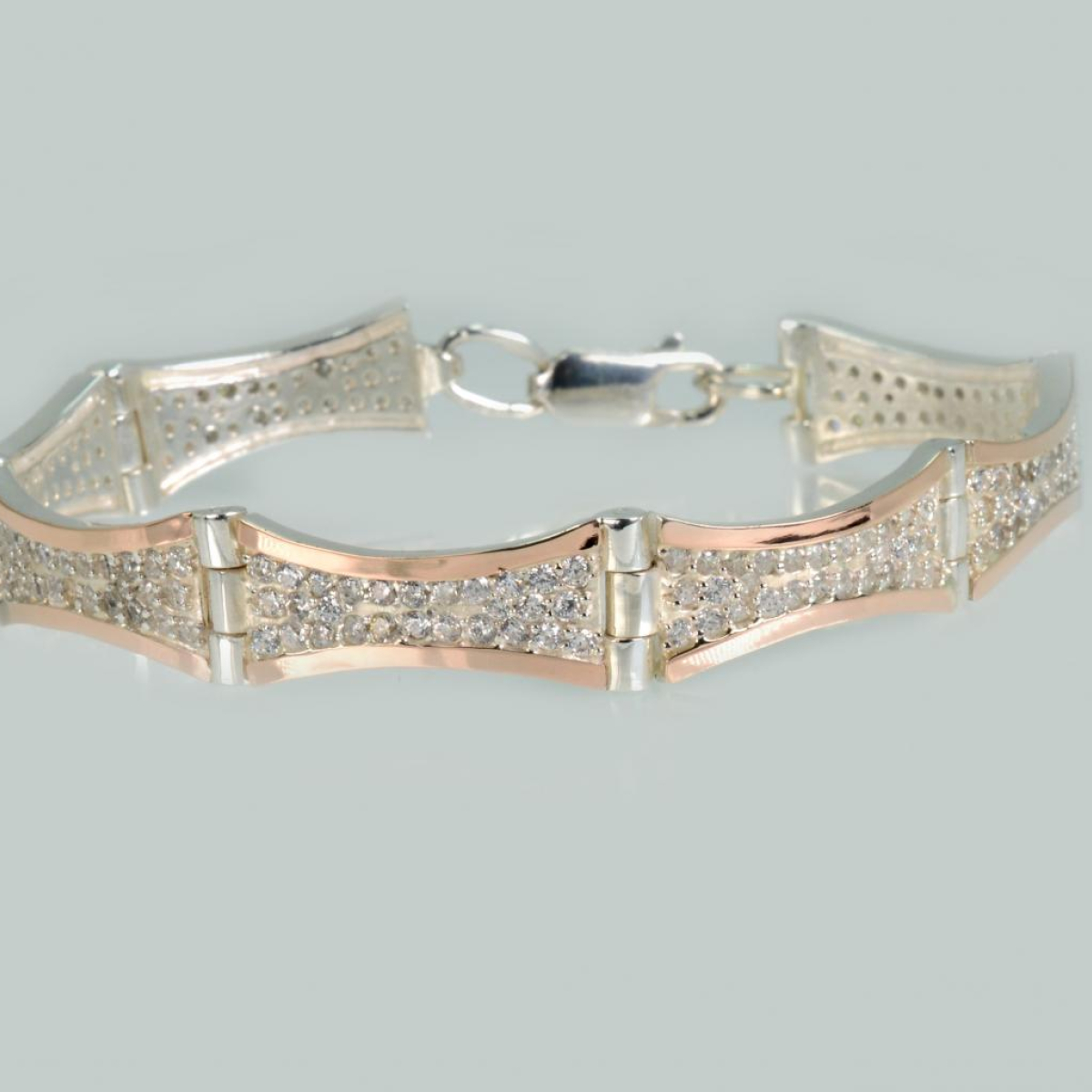 Срібний браслет з золотими напайками