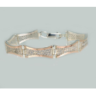 Срібний браслет з золотими напайками