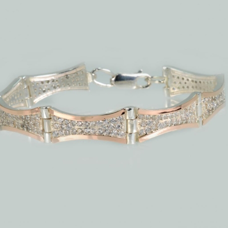 Срібний браслет з золотими напайками