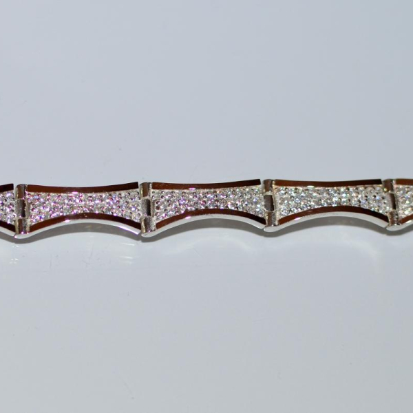 Срібний браслет з золотими напайками