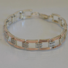 Серебряный браслет с золотыми пластинами