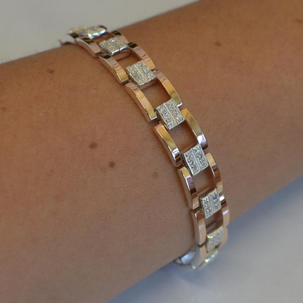 Серебряный браслет с золотыми пластинами