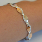 Срібний браслет з золотими накладками