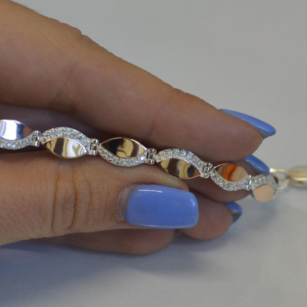 Срібний браслет з золотими накладками