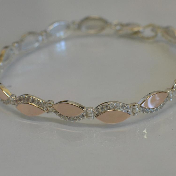 Срібний браслет з золотими накладками