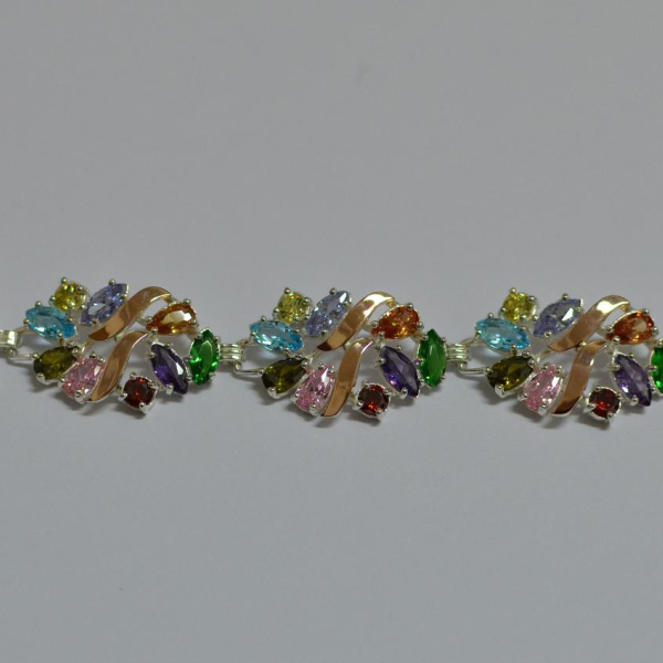 Срібний браслет з золотими вставками