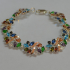 Срібний браслет з золотими вставками