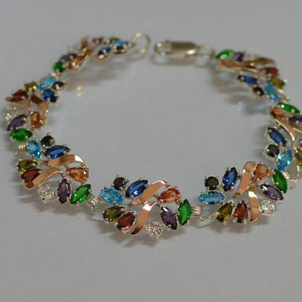 Срібний браслет з золотими вставками