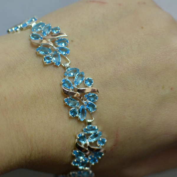 Срібний браслет з золотими вставками