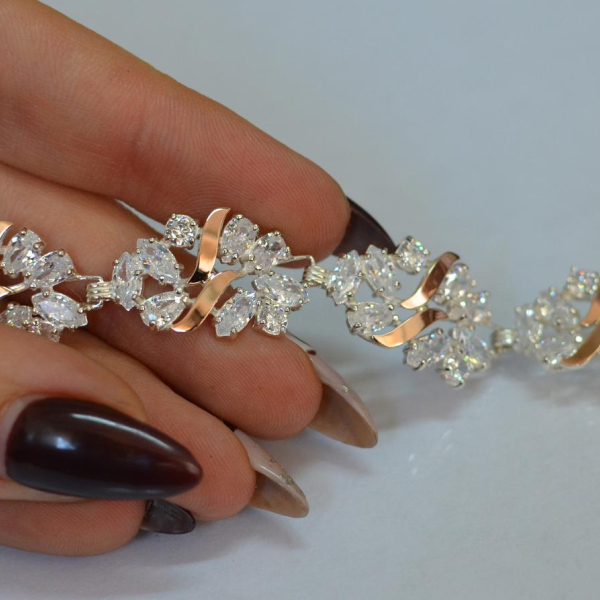 Срібний браслет з золотими вставками