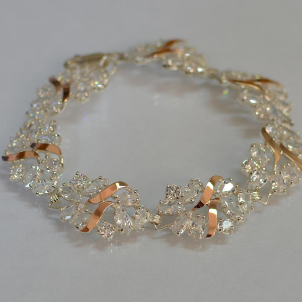 Срібний браслет з золотими вставками