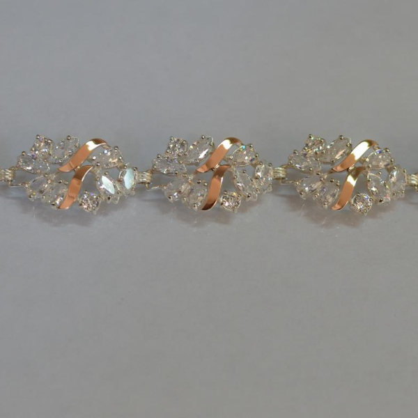 Срібний браслет з золотими вставками