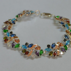 Срібний браслет з золотими вставками