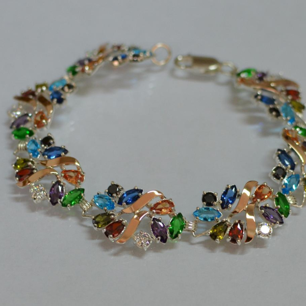 Срібний браслет з золотими вставками