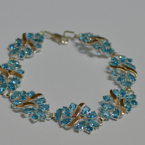 Срібний браслет з золотими вставками