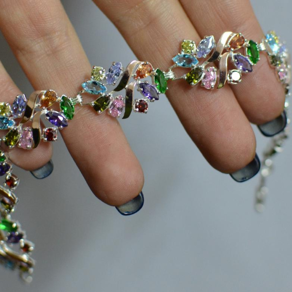 Срібний браслет з золотими вставками