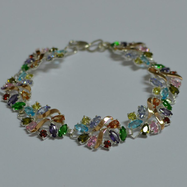 Срібний браслет з золотими вставками